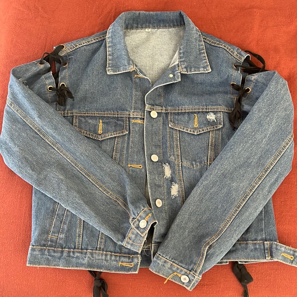 Jean jacket with lace up detail
